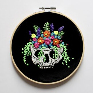 glow in the dark embroidered floral skull 6” embroidery hoop, hand stitched spooky cute home decor, neon and black velvet wall art, Halloween decor