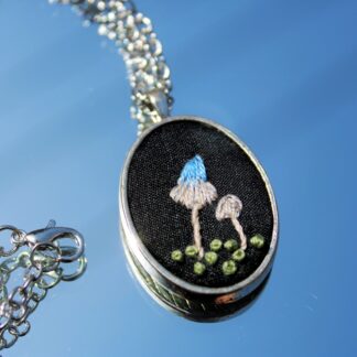 Blue Mushroom Hand Embroidered Necklace – Silver Frame
