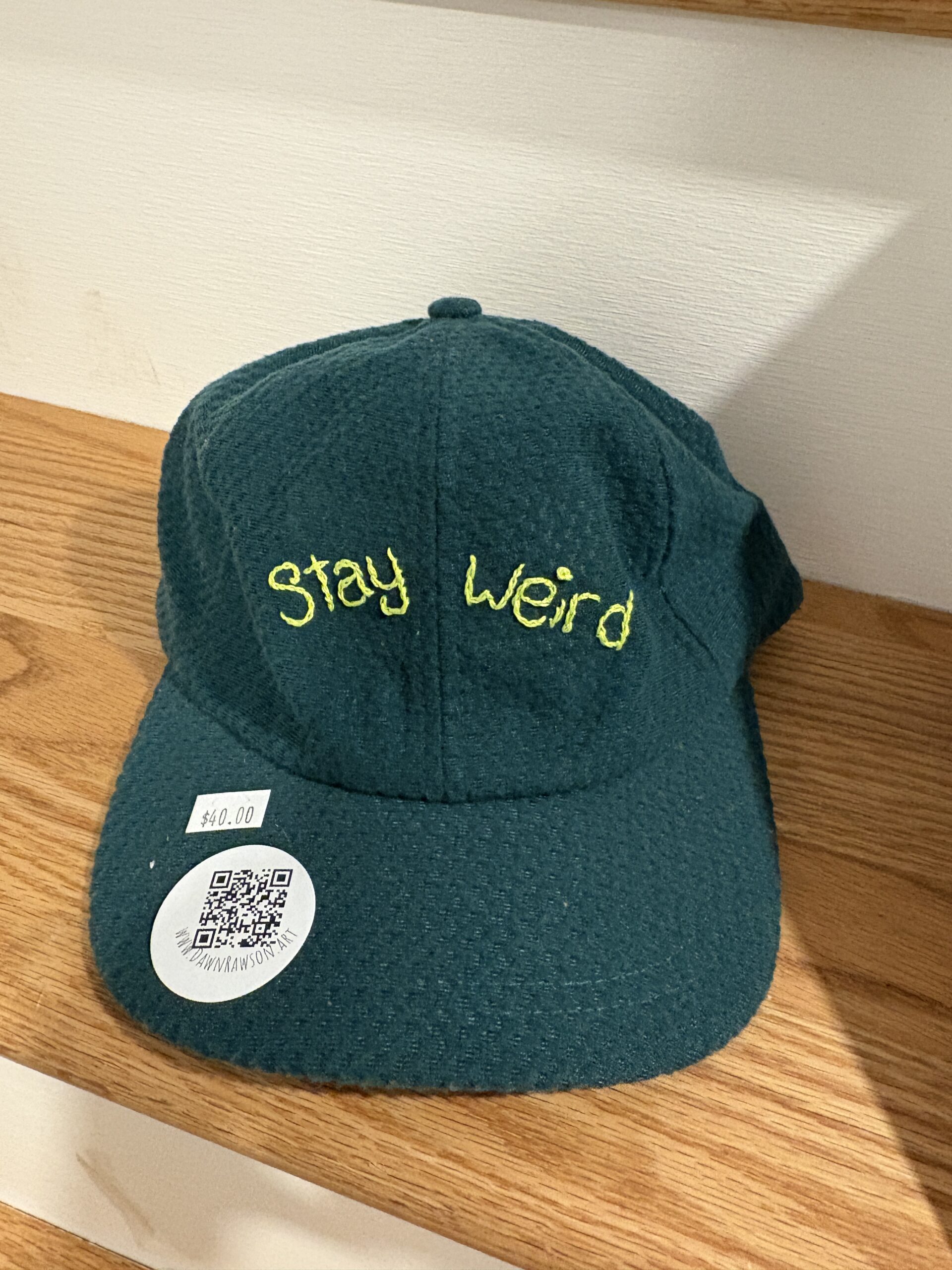 Green “STAY WEIRD” Hat (Neon Yellow Embroidery)